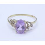 A 9ct gold, amethyst and diamond ring, 1.