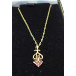 A 9ct gold pendant with chain, total weight 1.