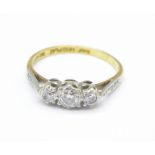 An 18ct gold and diamond ring, 2.