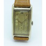 An 18ct white gold tank shaped Longines wristwatch,