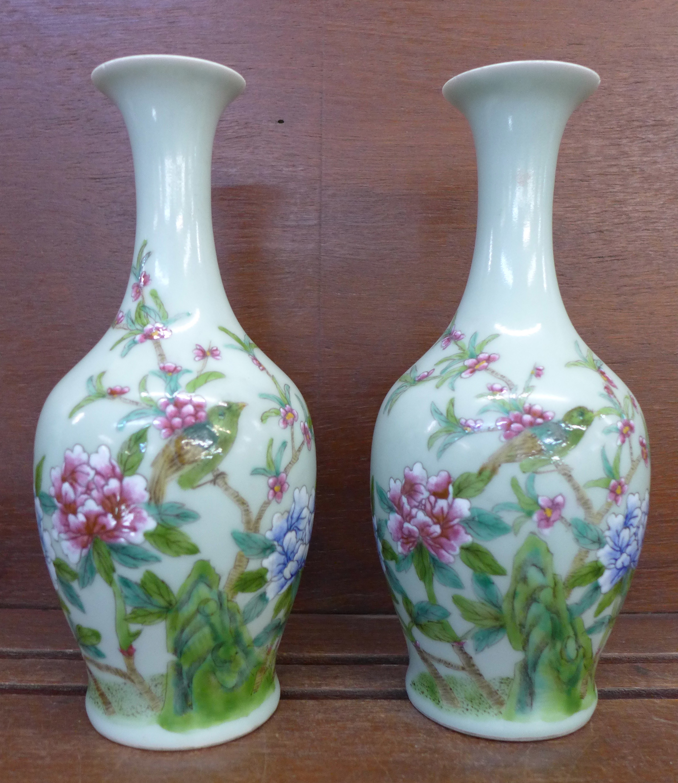 A pair of Chinese Celadon vases, with Qianlong mark, 23.
