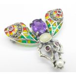 A plique-a-jour silver, ruby, pearl and amethyst insect brooch/pendant,