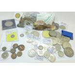 A collection of coins including commemorative crowns, a USA 1853 one dime, Roman coins, etc.