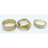 Two 9ct gold rings and a puzzle ring marked 14ct, (5.5g, P, 4g, O and 3.