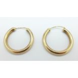 A pair of hallmarked 9ct gold earrings, 3.