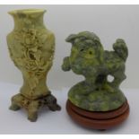 Two carved soapstone figures, Chinese dog and a vase, a/f,