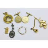 A 9ct gold pendant and charm, 3.4g, a picture locket, a pair of coin cufflinks, etc.
