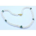 A pearl and malachite necklace