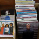 A box of 7" vinyl singles,