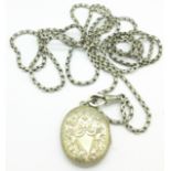 A locket and guard chain