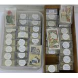 Forty-two sets and part sets of cigarette cards