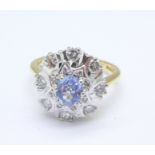 An 18ct gold, sapphire and diamond cluster ring, London 1980, diamond content 0.70ct, 6.