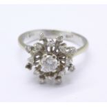 An Art Deco 18ct white gold, diamond cluster ring, lacking one stone, 3.