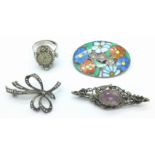 Three brooches including one hallmarked silver and enamel by A.H.