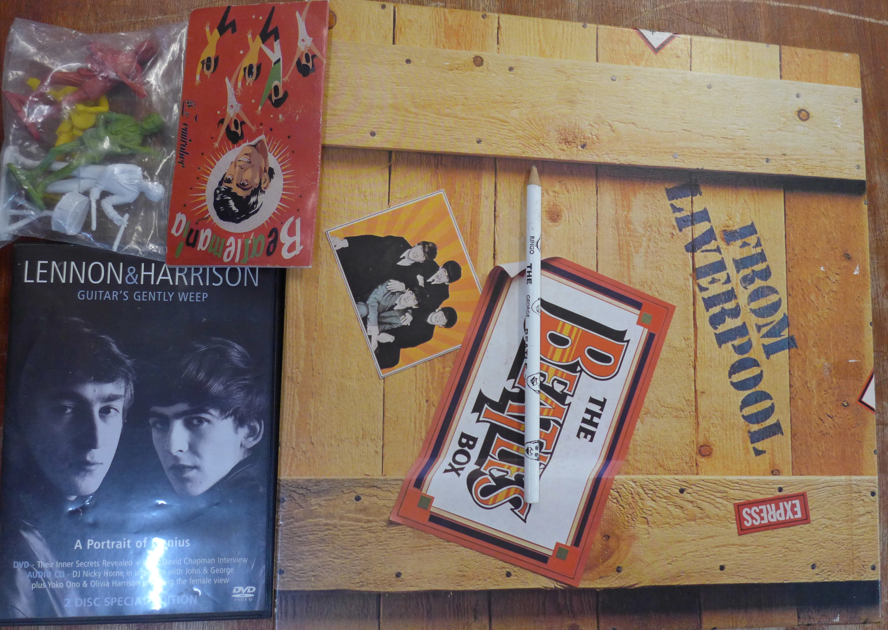 The Beatles Box 'From Liverpool' LP record set, a Lennon and Harrison DVD,