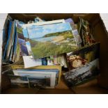 A box of modern postcards