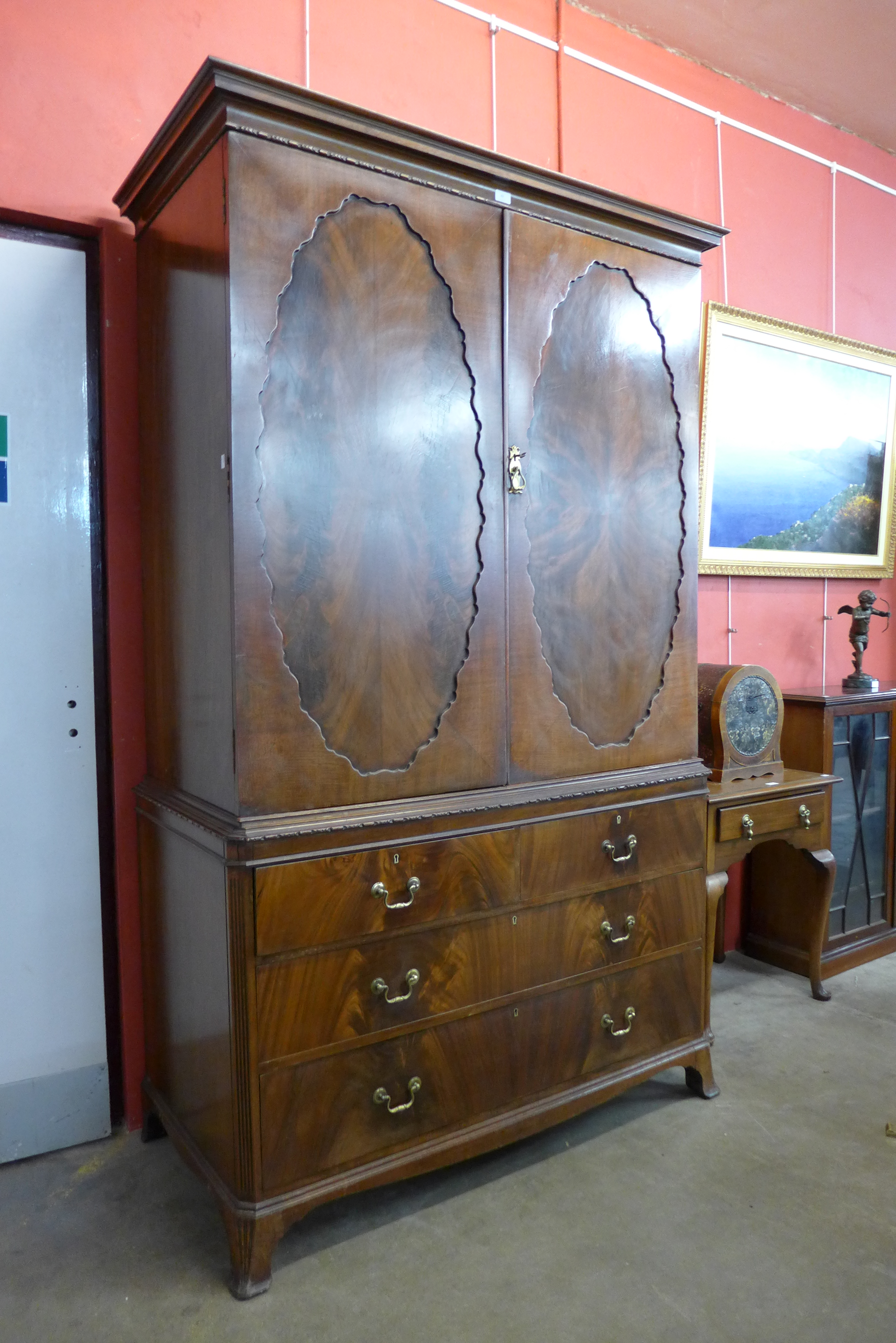 A Victorian mahogany linen press (converted to a wardrobe)