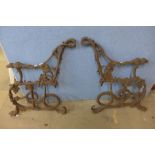 A pair of Victorian Coalbrookdale Serpent and Grapes design bench ends