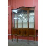 An Edward VII inlaid mahogany breakfront display cabinet