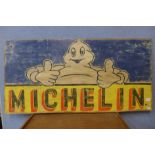 A reproduction painted Michelin sign