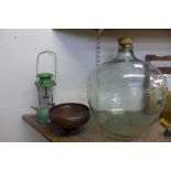 A glass carboy,