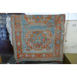 An oriental rug retailed by Liberty & Co