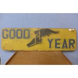 A reproduction painted Goodyear sign