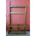 A Victorian pitch pine double hall stand