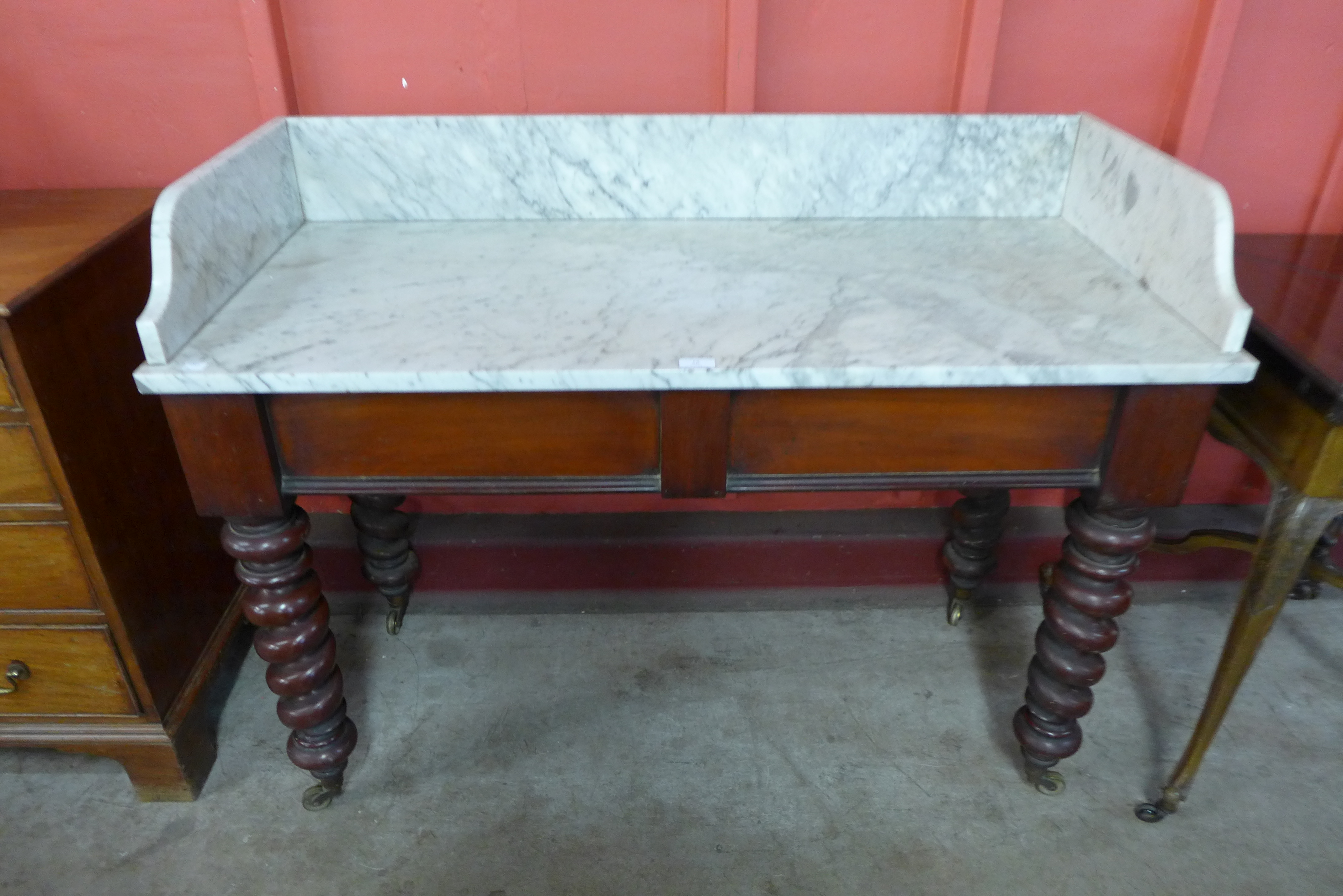 A Victorian mahogany and marble topped washstand