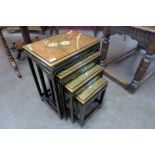 A Chinese lacquered nest of quartetto tables