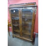 A French Louis XV style rosewood and ormolu mounted bookcase