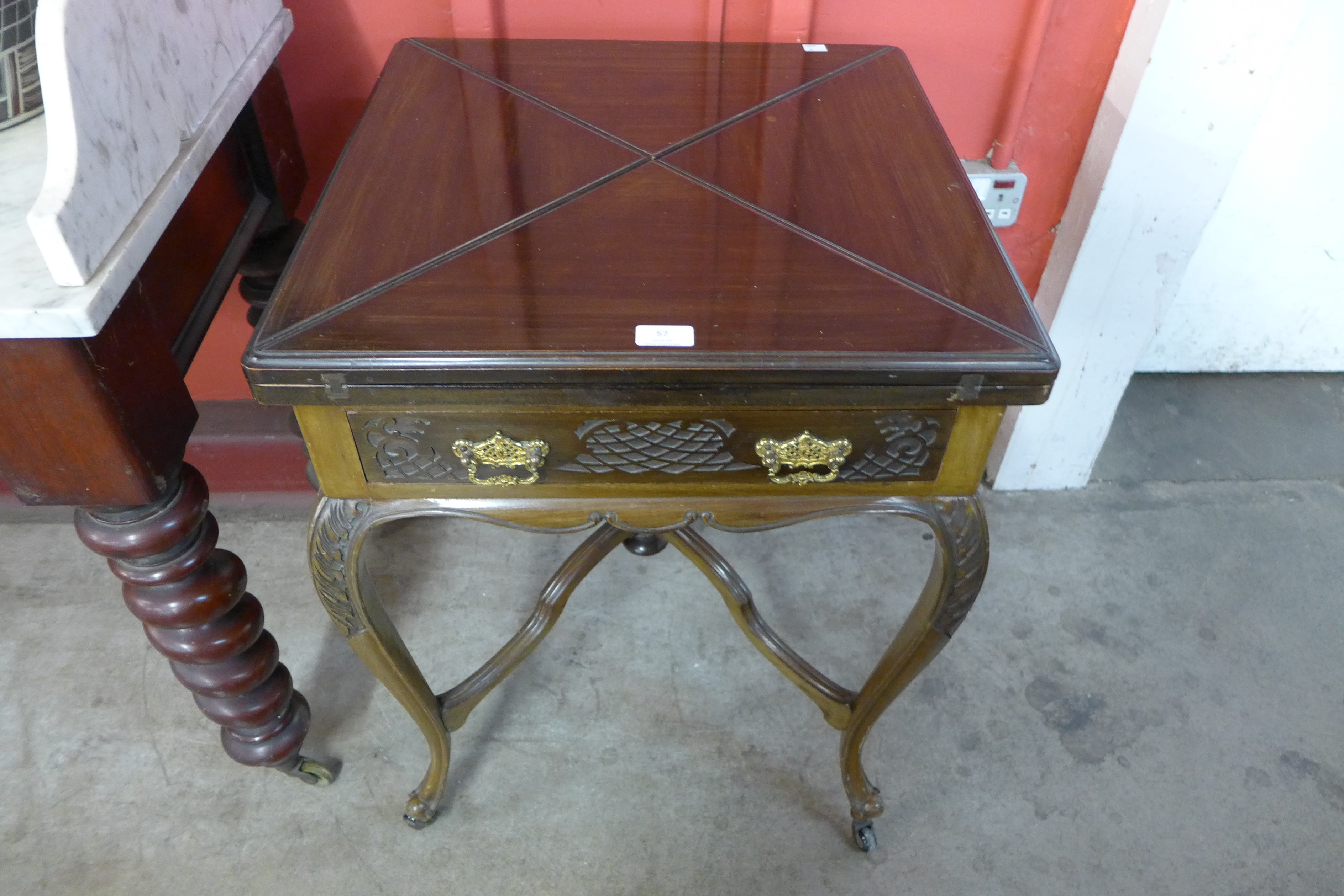 An Edward VII mahogany envelope card table