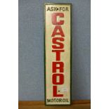 A reproduction cast iron Castrol sign