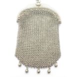 A Victorian white metal mesh purse with unusual second inner purse section,