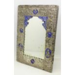 A white metal mounted mirror with fully covered and decorated back in white metal, height 21.