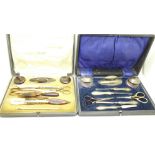 A collection of manicures including silver mounted and a pair of Georgian scissors,