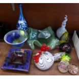 Twelve items of glass; cockerel, five paperweights, two ashtrays, a green studio glass bowl,