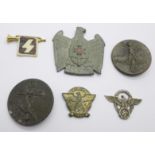 Five German badges, three lacking pins and one other item,