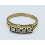 A 9ct gold, four stone diamond ring, 2.