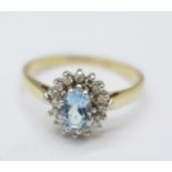 A 9ct gold, aquamarine and diamond cluster ring, 1.