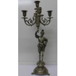 A figural silver plated candelabra in the form of a Spanish soldier,