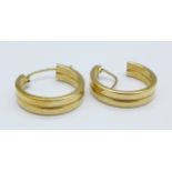 A pair of 10k gold earrings, 2.