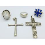 Two silver cross pendants and three silver rings, all marked .925, 27.