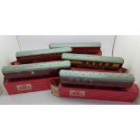 Hornby Dublo model rail; 4075 Brake Van x2 and three others, 4035, 4052 and 4084,