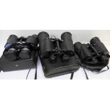 Three pairs of binoculars