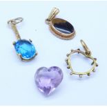 Three hallmarked 9ct gold pendants including one Blue John,