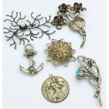 Five brooches and a pendant, (two spray brooches marked silver),