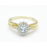 A 9ct gold, aquamarine and diamond cluster ring, 3.