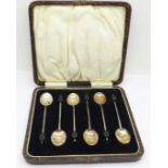 A cased set of six silver coffee bean spoons