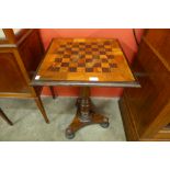 A Victorian rosewood and marquetry games table